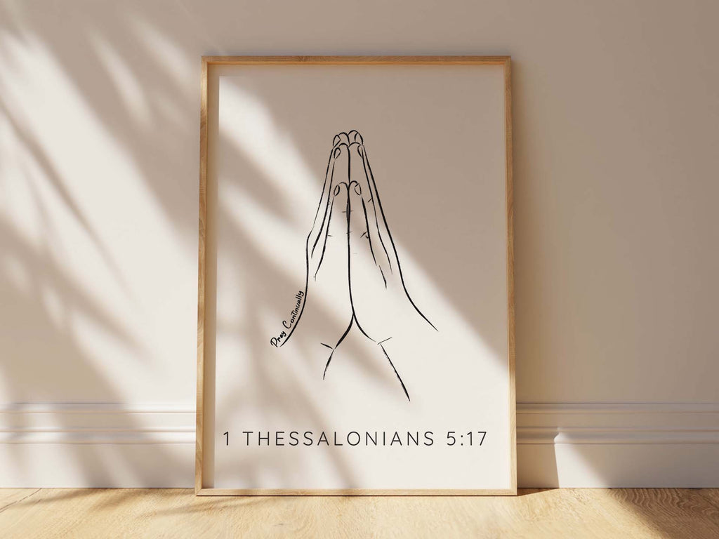 Inspiring spiritual decor - praying hands and 'Pray Continually' quote in a minimalist print for your tranquil space.