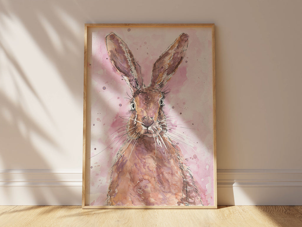 Watercolor hare print featuring a graceful rabbit against a lively pink spatter background, blending elegance with vibrant artistic flair.