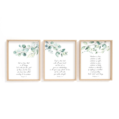 Botanical scripture wall art with eucalyptus leaves and Romans 8:28 verse.