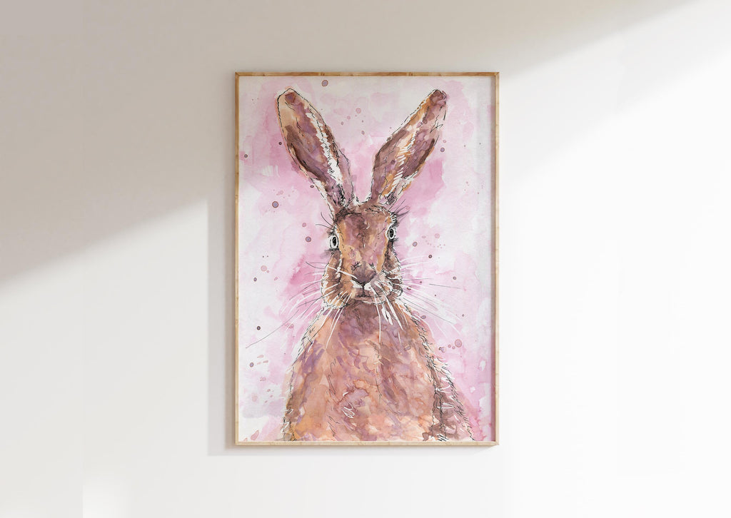 Watercolour hare print with a charming pink spatter background, showcasing the grace and elegance of this beautiful animal in a unique and artistic portrayal.