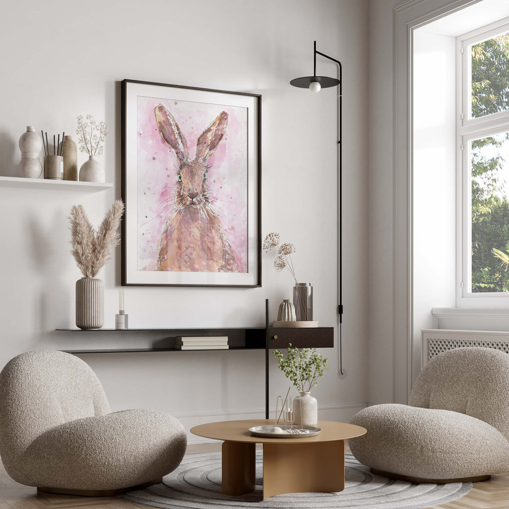 Watercolor hare print with pink spatter background, capturing the grace and whimsy of the hare in a delightful and artistic composition