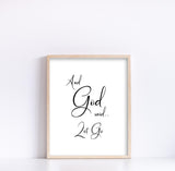 Minimalist Christian print in black and white with swirly writing of 'And God Said Let Go'.